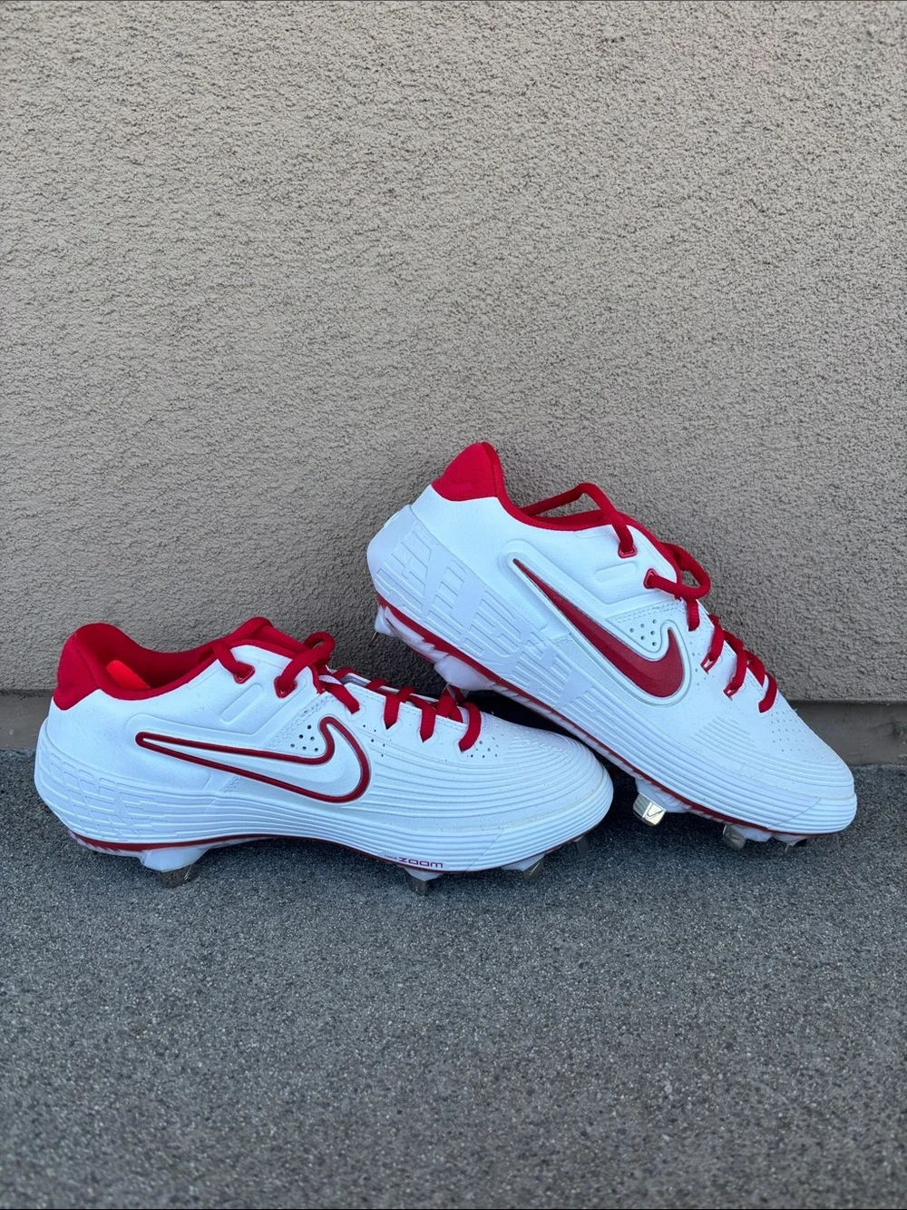 Nike White and Red Softball Cleats with Red Swoosh